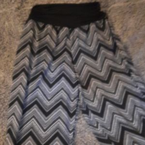 Patterned long pants.